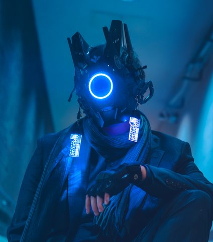 Liam's avatar: a figure in a dark helmet with a glowing blue ring for a face